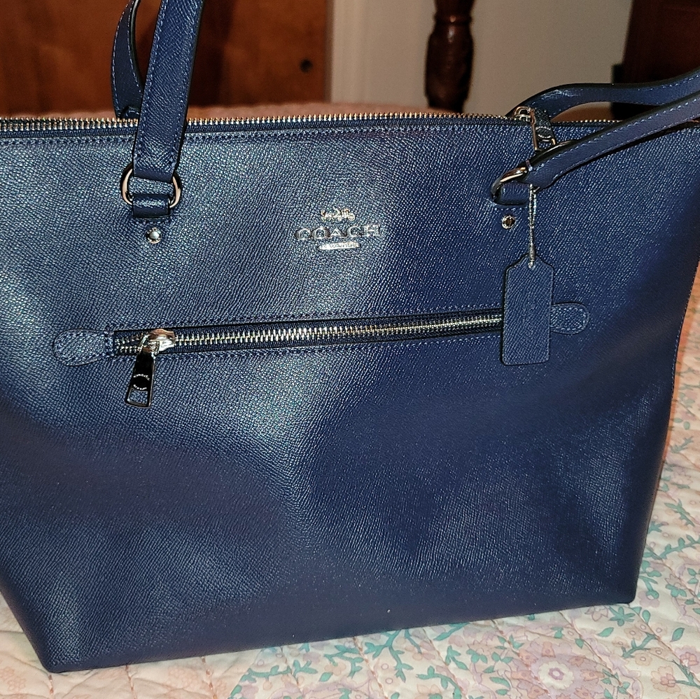 A beautiful blue coach purse